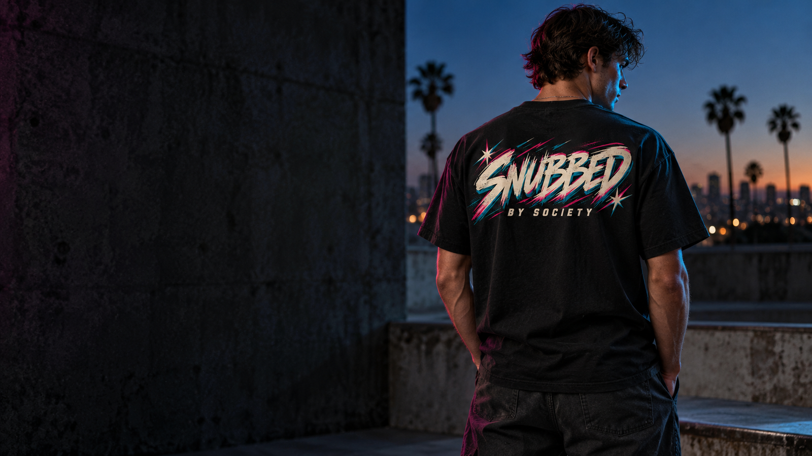Snubbed by Society Neon Outcast tee campaign at dusk